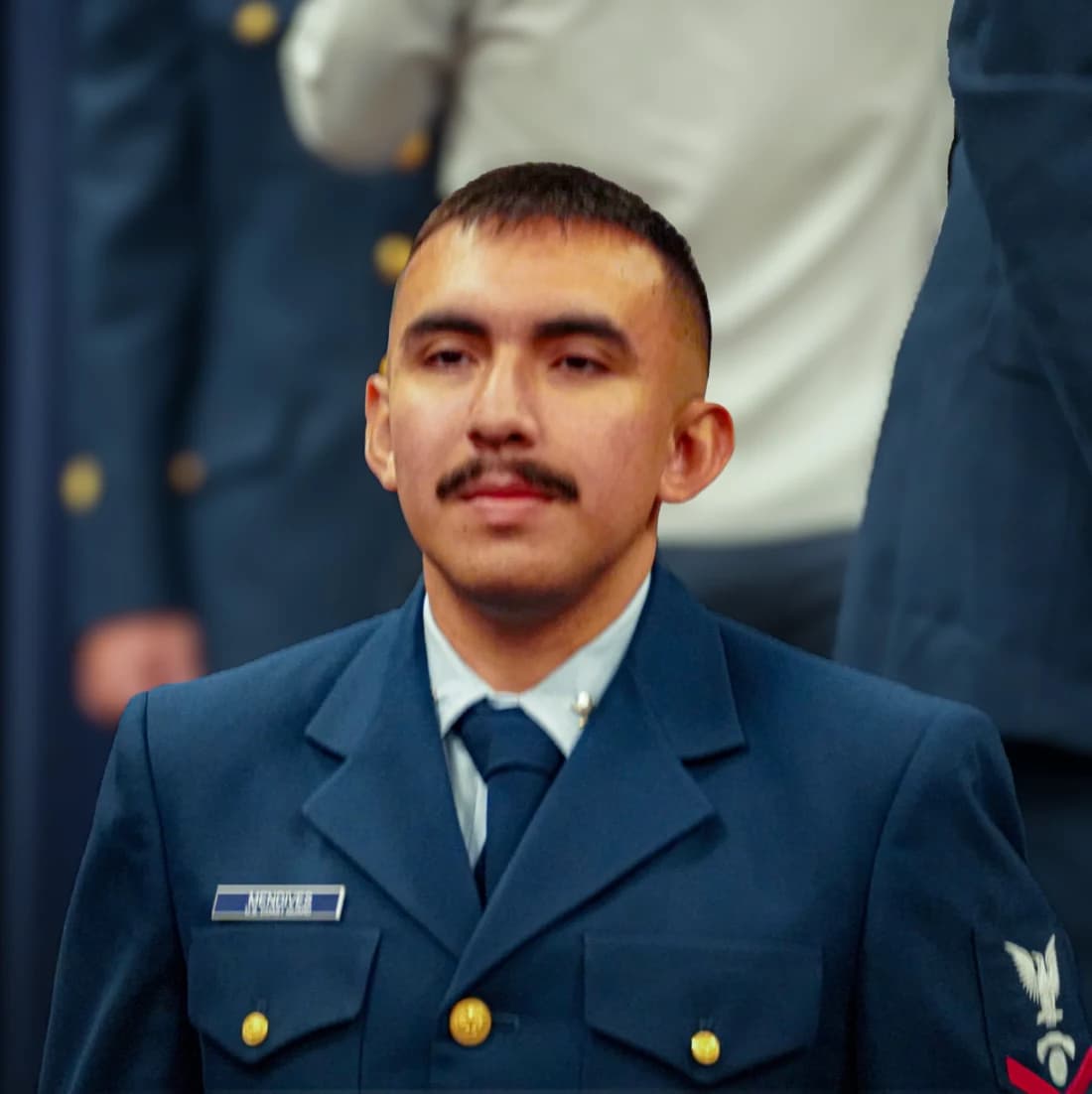 Josue Mendives in U.S. Coast Guard dress uniform
